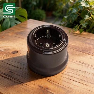 China OEM Decorative Vintage Ceramic Socket with Timeless Design for Rustic Homes, Cafés, Restaurants, and Commercial Lighting Spaces Hersteller